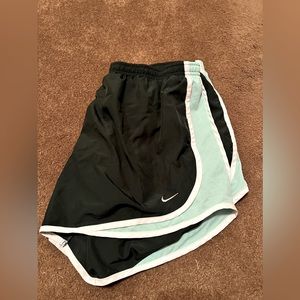 Dark and seafoam green Nike shorts